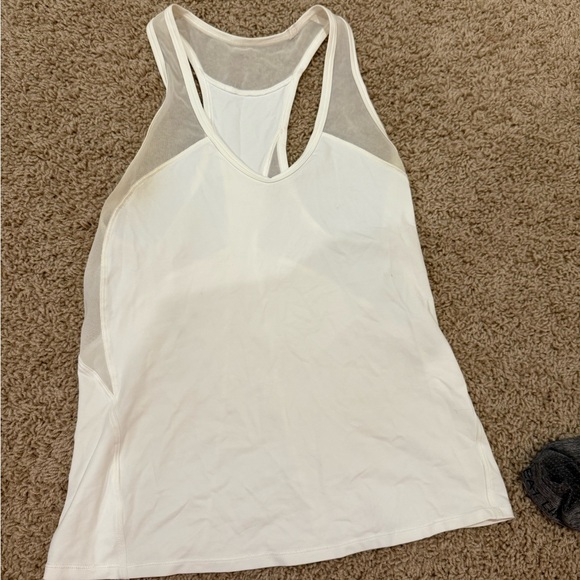 Lululemon Athletica White Tank! Very flattering-old style but still cute - Picture 1 of 4